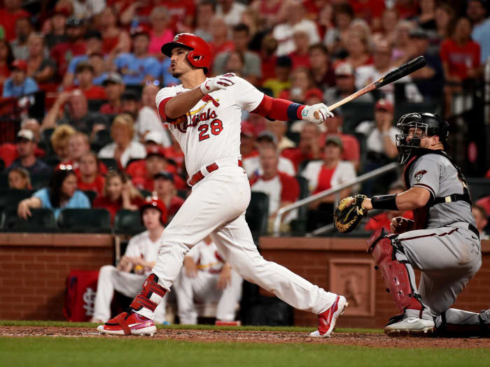 Jun 29, 2021; St. Louis, Missouri, USA; St. Louis Cardinals third baseman Nolan Arenado (28) hits a two run home run against the Arizona Diamondbacks during the fifth inning at Busch Stadium.